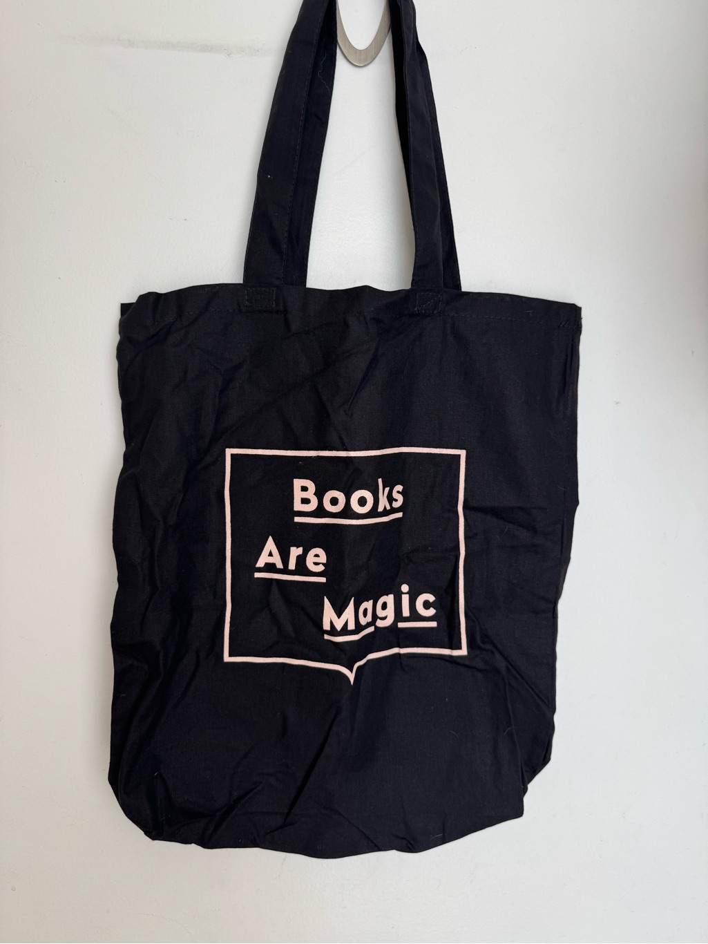 Books Are Magic Black Tote Bag With Pink Print
